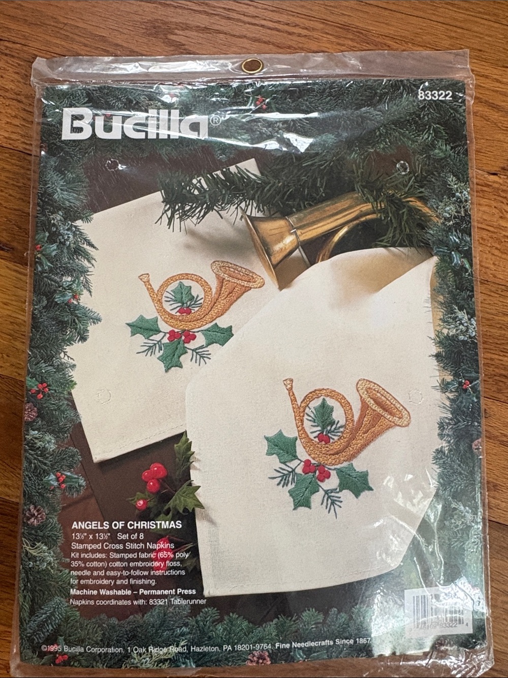 Bucilla Cream Christmas Napkins with Gold Horn and Green Holly
